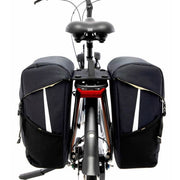 Zwarte New Looxs Sport Double MIK 2.0 dubbele fietstas met 40 liter inhoud, bevestigd aan een fiets, geschikt voor dagelijks gebruik.