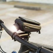 SP Connect Stuurtas Wedge Case op fietsstuur met bevestigingsclip, zwart en compact voor smartphone en accessoires.