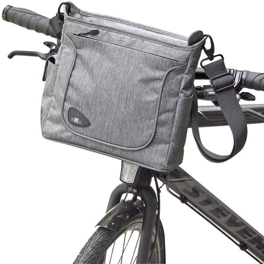 Stuurtas voor fiets van KLICKfix, zwart kunststof met bevestigingspunten en verstelbare riem, geschikt voor fietsonderdelen.