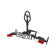 Zwarte Hapro Atlas Xfold I fietsendrager voor trekhaak, kantelbaar, 13-polig, geschikt voor fietsen.