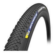Michelin Gravelband 28" Power Gravel TLR 47-622 vouwband, close-up van het profiel en de textuur van de buitenband.