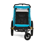 Burley D'lite X kinderfietskar in sage groen en charcoal grijs, geschikt voor één kind, met comfortabele zit en veiligheidsriemen.
