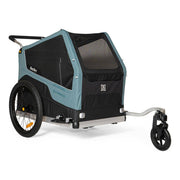 Zwarte en blauwe Burley Bark Ranger XL hondenfietskar met 20-inch wielen, geschikt voor honden en comfortabel voor reizen.