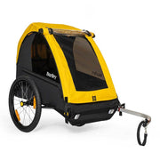 Burley Bee Double kinderfietskar in geel en zwart met ruimte voor twee kinderen, geschikt voor fietsen.