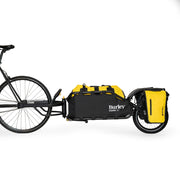 Burley Coho XC Transport Black fietsaanhanger met vering, geschikt voor kindertransport en bagage, zichtbaar in de afbeelding