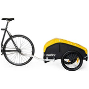 Inklapbare Burley Nomad transportkar voor fietsen, met ruimte tot 45 kg, zichtbaar in de afbeelding.