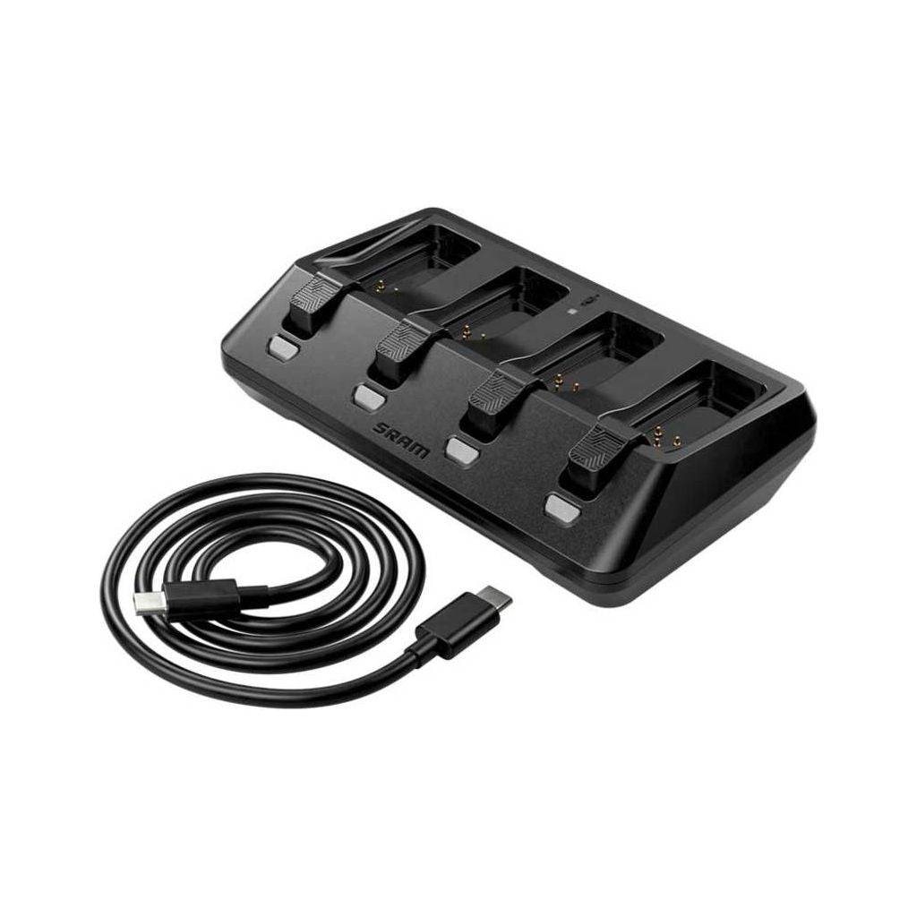 Sram AXS A1 acculader voor draadloze elektronische fietssystemen, zwart met oplaadpoort en kabel.