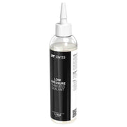 DT Swiss bandenreparatie sealant voor lage druk, vloeistof in een open fles met label zichtbaar