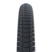 Schwalbe Big Ben Plus 27.5" stadsfiets buitenband met GreenGuard en Double Defense, zwart, liggend op een witte achtergrond