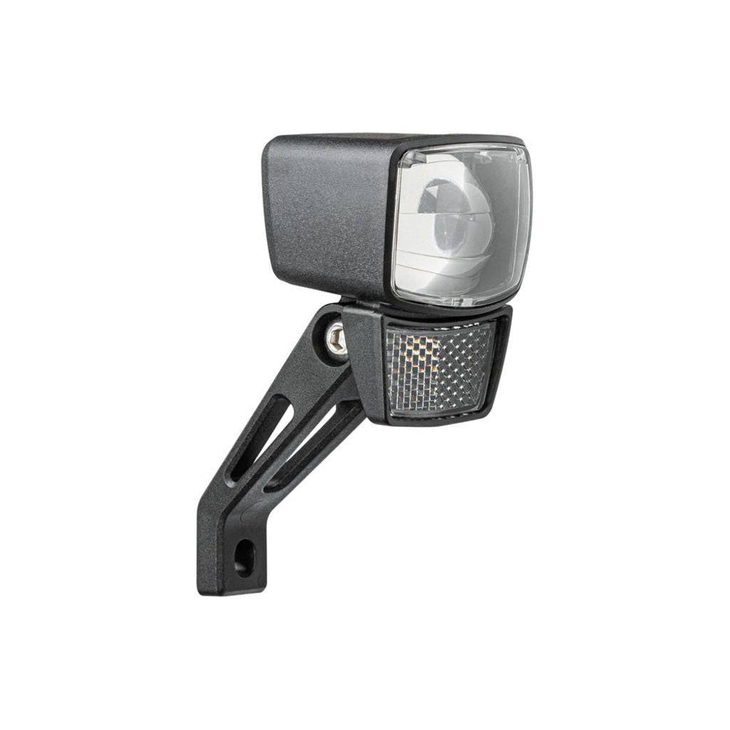 Zwarte Axa Nxt Steady Dynamo koplamp met stevige behuizing en bevestigingsbeugel, geschikt voor fietsverlichting.