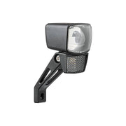 Zwarte Axa Nxt Steady Dynamo koplamp met stevige behuizing en bevestigingsbeugel, geschikt voor fietsverlichting.