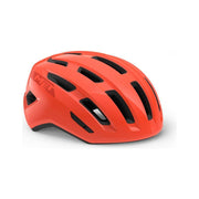 Racefiets helm MET Miles Mips met ventilatiegaten en verstelbare riem, ontworpen voor wielrenners en veiligheid.