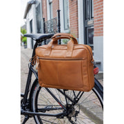 Nieuwe Looxs Luko leren fietstas voor één fiets, 7,5 liter, geschikt voor 15-inch laptop, zichtbaar met leren afwerking.