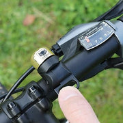 Cateye Nido Oh-1500 fietsbel met tweemaal klinkend geluid, ronde vorm en zwart design voor fietsaccessoires.