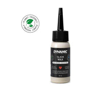 Dynamic Slick Wax Lube wax en olie voor smeermiddelen, in een transparante fles met zwarte dop en gekleurde label.
