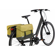 Nieuwe Looxs Joli dubbele fietstas van 37 liter, gemaakt van gerecycled polyester, met stevige handvatten en reflectie details.