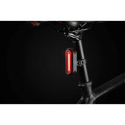 Axa Solis 800 USB verlichtingsset met witte led-lampen en verstelbare armen voor fietsverlichting.