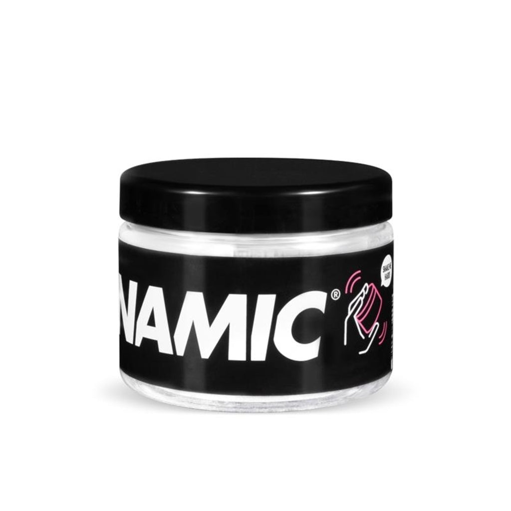 Dynamic Shake It Off 500 ml kettingreiniger, ontvetter voor motorfietskettingen, toont de fles en een schone ketting in actie.