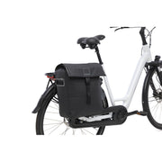 Nieuwe Looxs Leeds enkele fietstas van 19 liter, gemaakt van gerecycled polyester, zwart met reflecterende details.