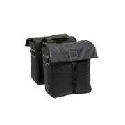 Dubbele fietstas van New Looxs Leeds, 38 liter, gemaakt van gerecycled polyester, met stevige handgrepen en reflecterende details.