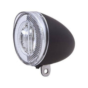Zwarte Spanninga Swingo Xb LED koplamp met reflector en batterijen, geschikt voor fietsverlichting, duidelijk zichtbaar in de afbeelding