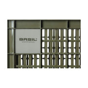 Basil Crate L 40 liter fietskrat van gerecycled kunststof voor fietsaccessoires en boodschappen, in groen met handvatten.