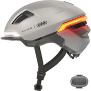 Abus Hyp-E snelheidsfietshoofdbescherming met geïntegreerde verlichting voor speed pedelecs, in zwart met reflectie.