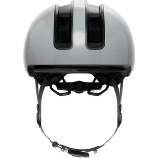 Abus E-bike helm Hud-Y met ventilatiegaten en verstelbare riem, ontworpen voor veilig fietsen op een elektrische fiets.