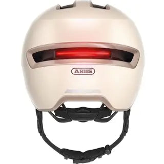 Abus Hud-Y urban e-bike helm met oplaadbare magnetische achter-LED en ventilatiegaten, geschikt voor comfortabel stadsfietsen.