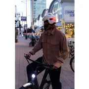 Abus Hud-Y urban e-bike helm met oplaadbare magnetische achter-LED en ventilerende pasvorm voor comfortabel en veilig fietsen.