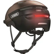 Abus Purl-Y Ace Speed Pedelec helm met geïntegreerd oplaadbaar LED-licht en NTA-geclassificeerde veiligheidskenmerken, zwart en geel ontwerp