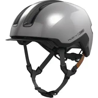 Abus E-bike helm Hud-Y met ventilatiegaten en stevige pasvorm voor veilig fietsen op een e-bike.