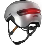 Abus Hud-Y Urban E-bike helm met magnetische USB-LED verlichting, ademend ontwerp en verstelbare pasvorm voor comfortabel fietsen.