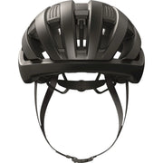 Abus Wingback racefietshelm met aerodynamisch ontwerp en ventilatieopeningen, geschikt voor wielrenners, in zwart en oranje.