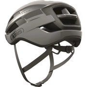Abus Wingback racefietshelm in zwart met aerodynamisch ontwerp en ventilatieopeningen, geschikt voor wielrenners.