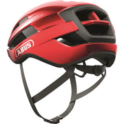 Abus Wingback racefietshelm met aerodynamisch ontwerp en verstelbare riem, geschikt voor wielrenners, zichtbaar op afbeelding.