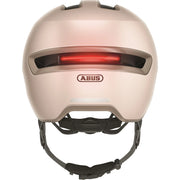 Abus Hud-Y Ace speed pedelechelm met geïntegreerd vizier en USB-achterlicht, lichtgewicht en veilig voor fietsers.
