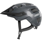 Abus Motrip MTB fietshelm in grijs met diepe pasvorm, ventilerend ontwerp voor mountainbiken en outdoor avonturen