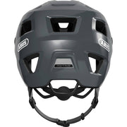 Abus Motrip MTB fietshelm met diepe pasvorm, grijs kleur, ventilatieopeningen en stevige constructie voor mountainbiken.
