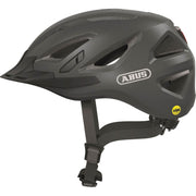 Abus Urban-I 3.0 Mips e-bike helm in donkergrijs en wit, geschikt voor veilig stadsfietsen en comfortabel dragen.