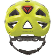 Abus Urban-I 3.0 Mips e-bike helm in geel met reflecterende details en ventilatieopeningen, geschikt voor comfortabel fietsen.