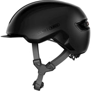 Abus Hud-Y e-bike helm met luxe velvet afwerking en oplaadbare magnetische achter-LED voor veilig fietsen.