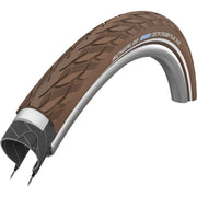 Bruine Schwalbe Delta Cruiser Plus 28" stadsfiets buitenband met PunctureGuard voor extra lekbescherming.
