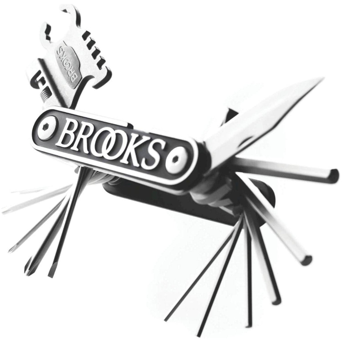 Brooks Multitool MT22 Zw, veelzijdig multitool met verschillende functies, ligt open op een werkbank met gereedschap en onderdelen.