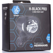 Herrmans H-Black Pro E koplamp met 6-12V en 230 lumen, zichtbaar op de fiets voor goede verlichting en veiligheid.