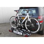Zwart Pro-User fietsbeschermset met universeel ontwerp en opbergtasje, beschermt fiets tegen stof en vuil.