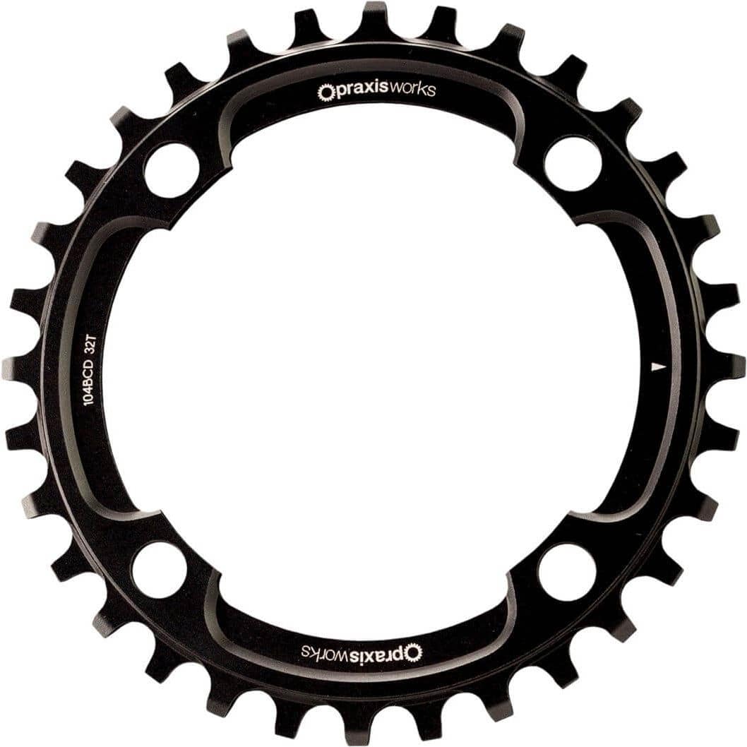 Zwart Praxis kettingblad voor MTB 12-speed, 1x 104 BCD, zichtbaar met tandprofiel en montagegaten op de afbeelding.