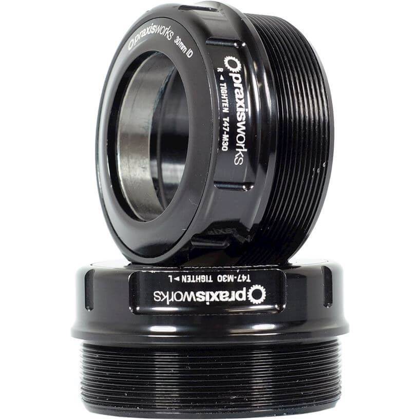Praxis Trapas Adapter M30 T47 voor race- en mountainbikes, geschikt voor 68-73 mm crankbussen, zwart kunststof.