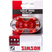 Simson achterlicht met 5 LED's en batterij voor zadelpen, zichtbaar op de fiets.