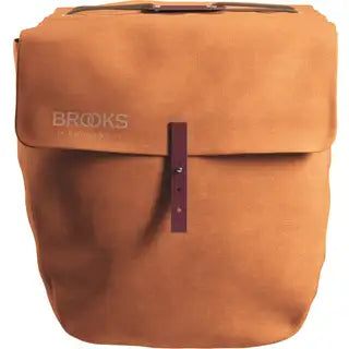 Brooks dubbele fietstas Brick Lane Panniers 30L, waterdicht en stevig, bevestigd aan fietsmand met verstelbare riemen.
